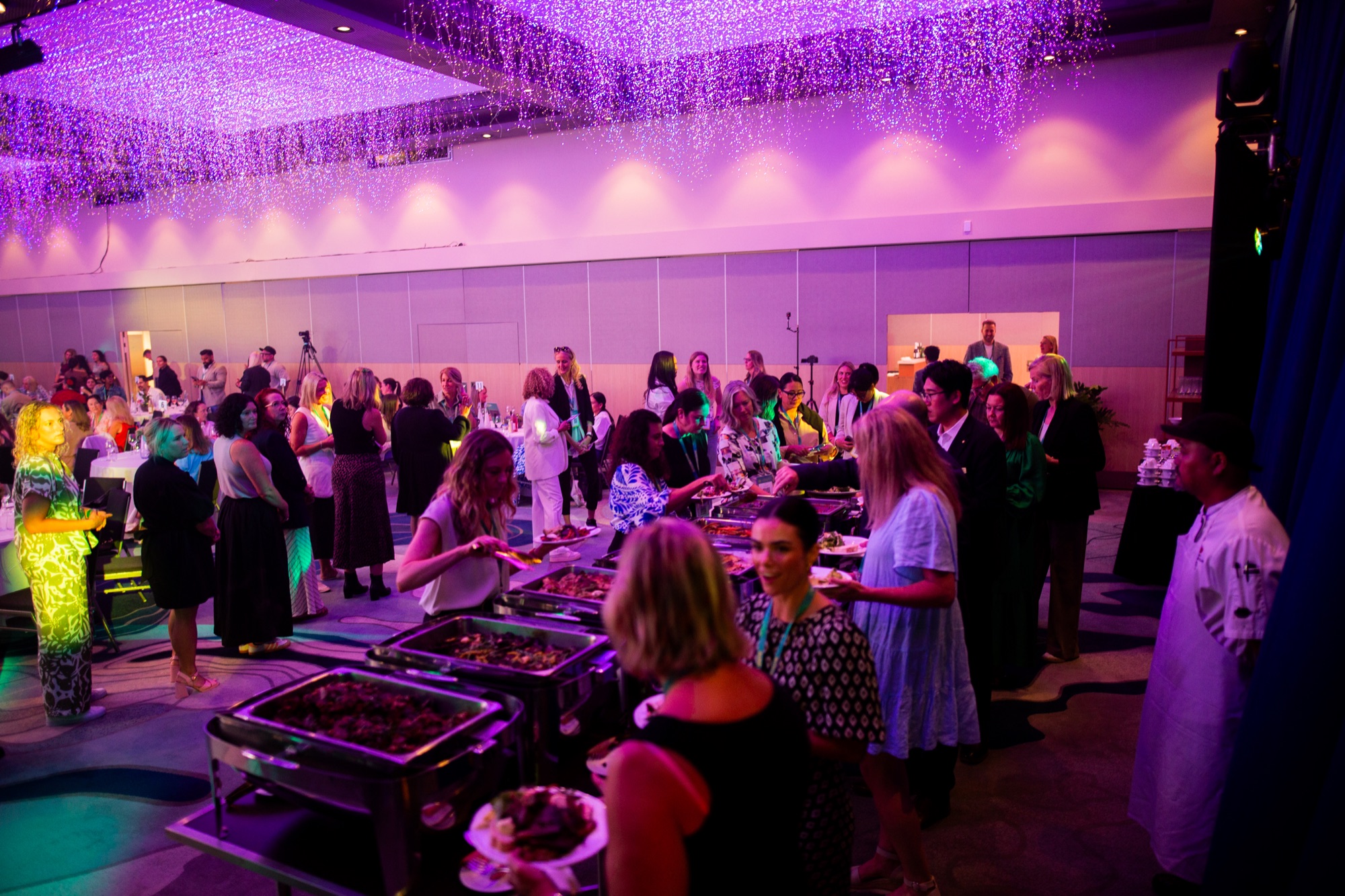Guests sharing a meal at Grand Millennium Auckland