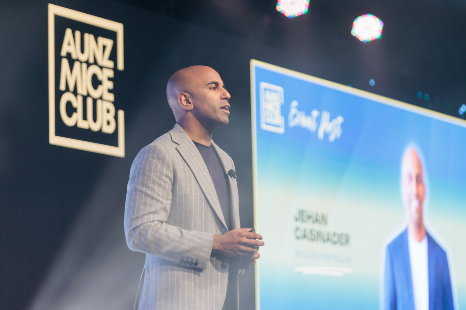 A speaker presenting at an AUNZ MICE Club event